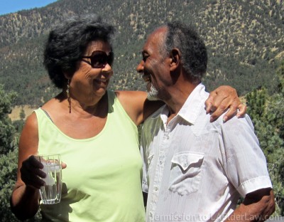 Couple happily smiling at one another, having avoided the costs of Probate,